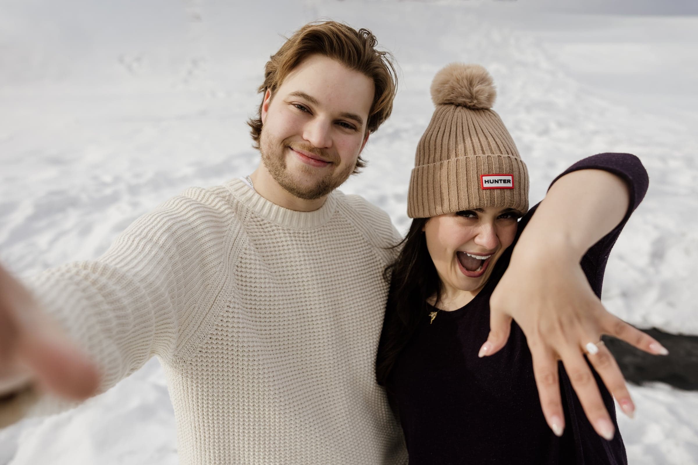 Victoria playfully showing her ring beside Christoph